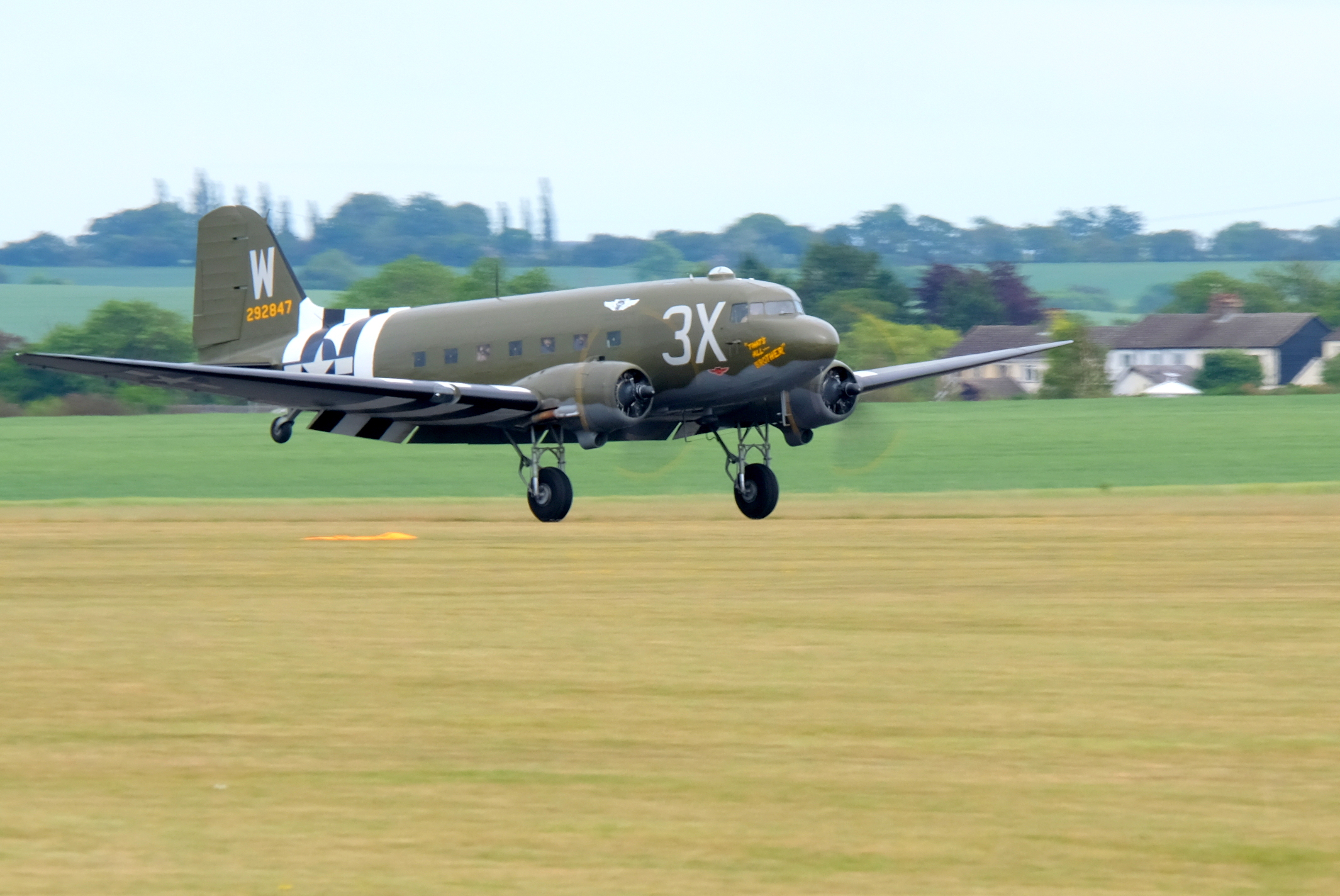 Image shows a Dakota taking off.
